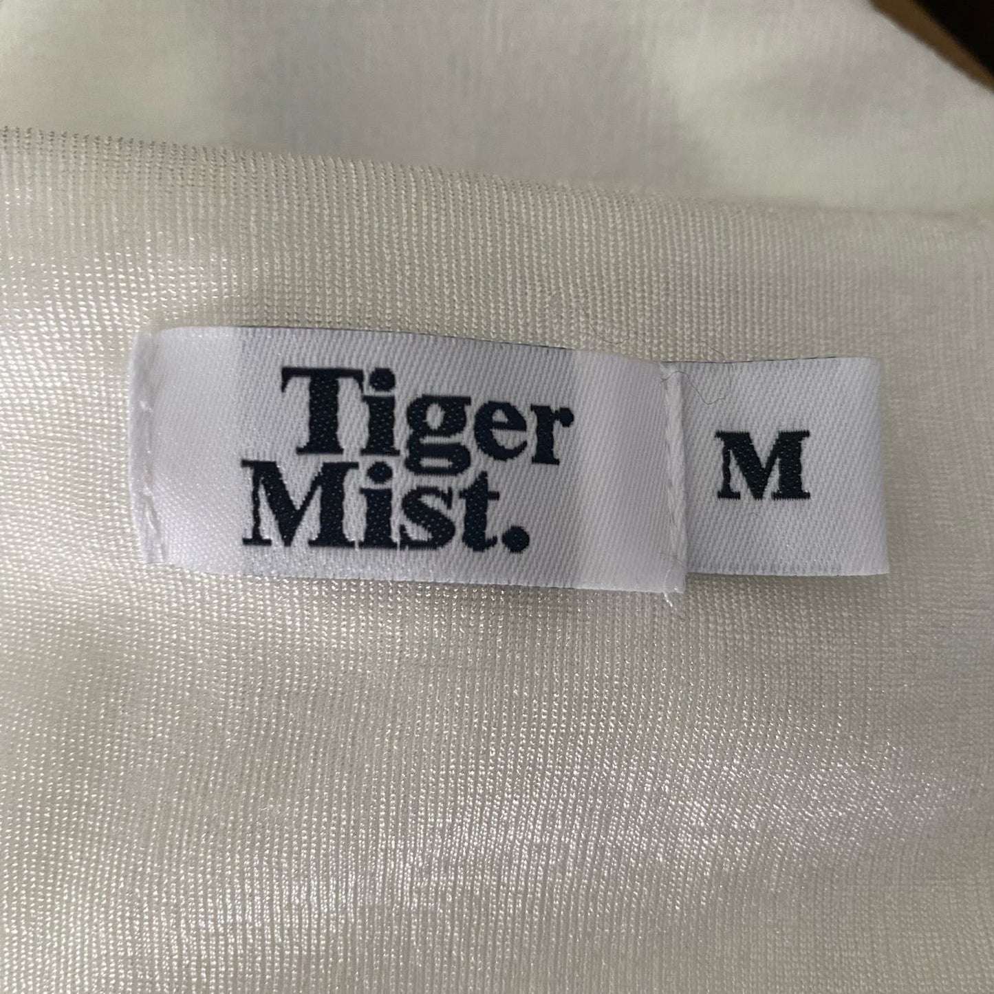 Tiger Mist sz M long sleeve plunge futuristic top